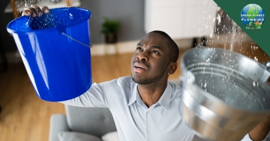 Man holding buckets.